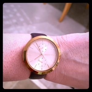 Michael Kors Rose Gold watch/ plum leather band. Brand new battery !